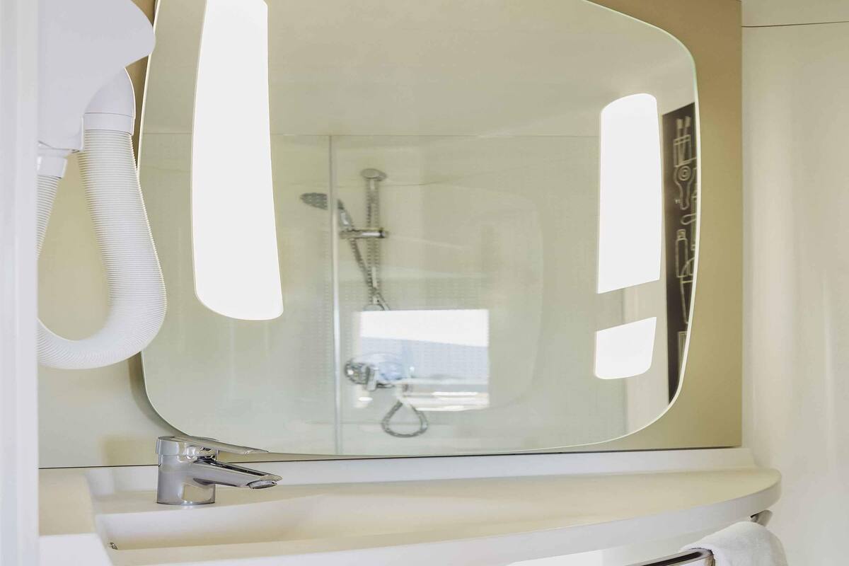 standard twin room | premium bedding, pillow-top beds, desk, blackout curtains