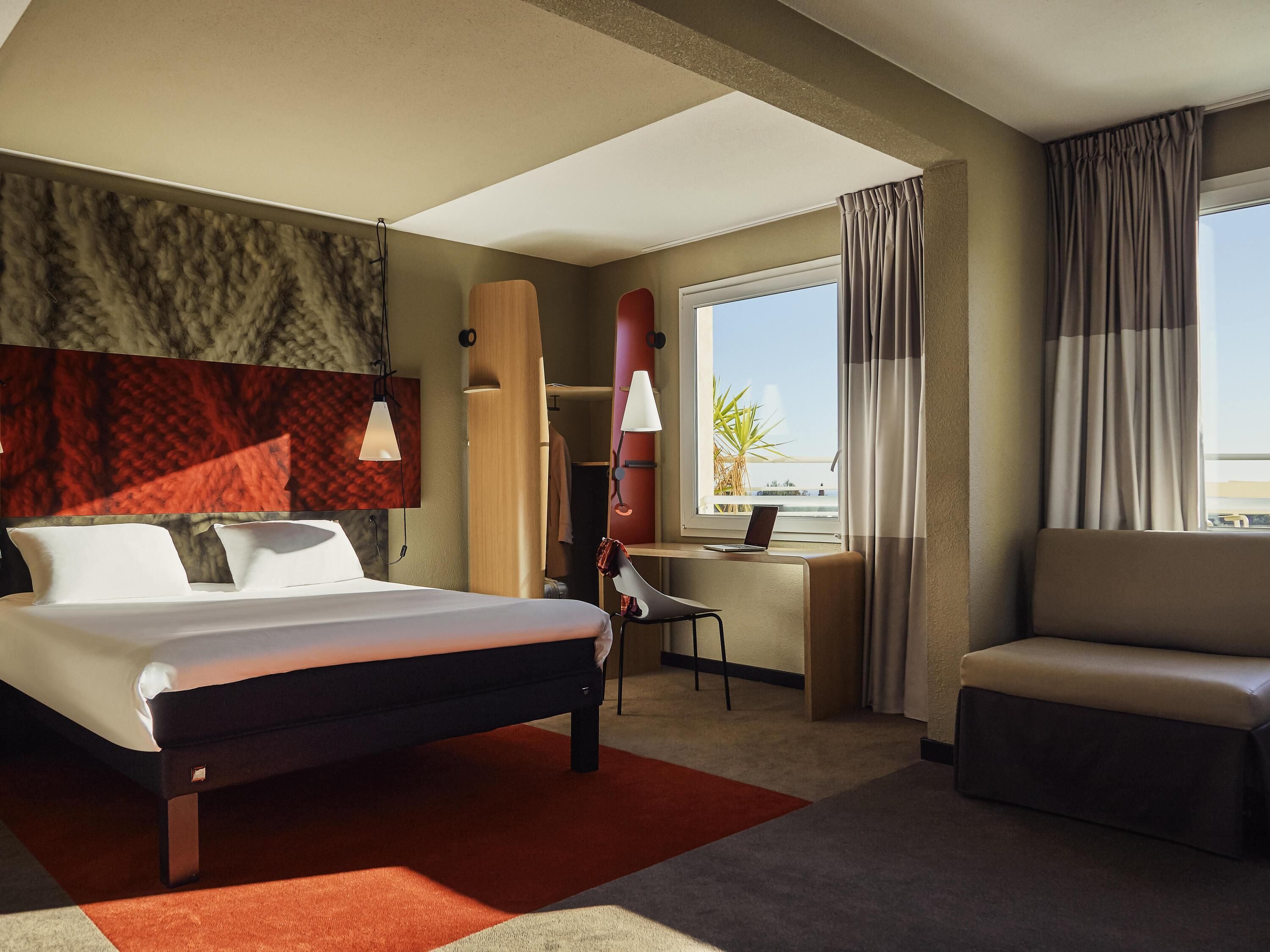 premium bedding, pillow-top beds, desk, blackout curtains