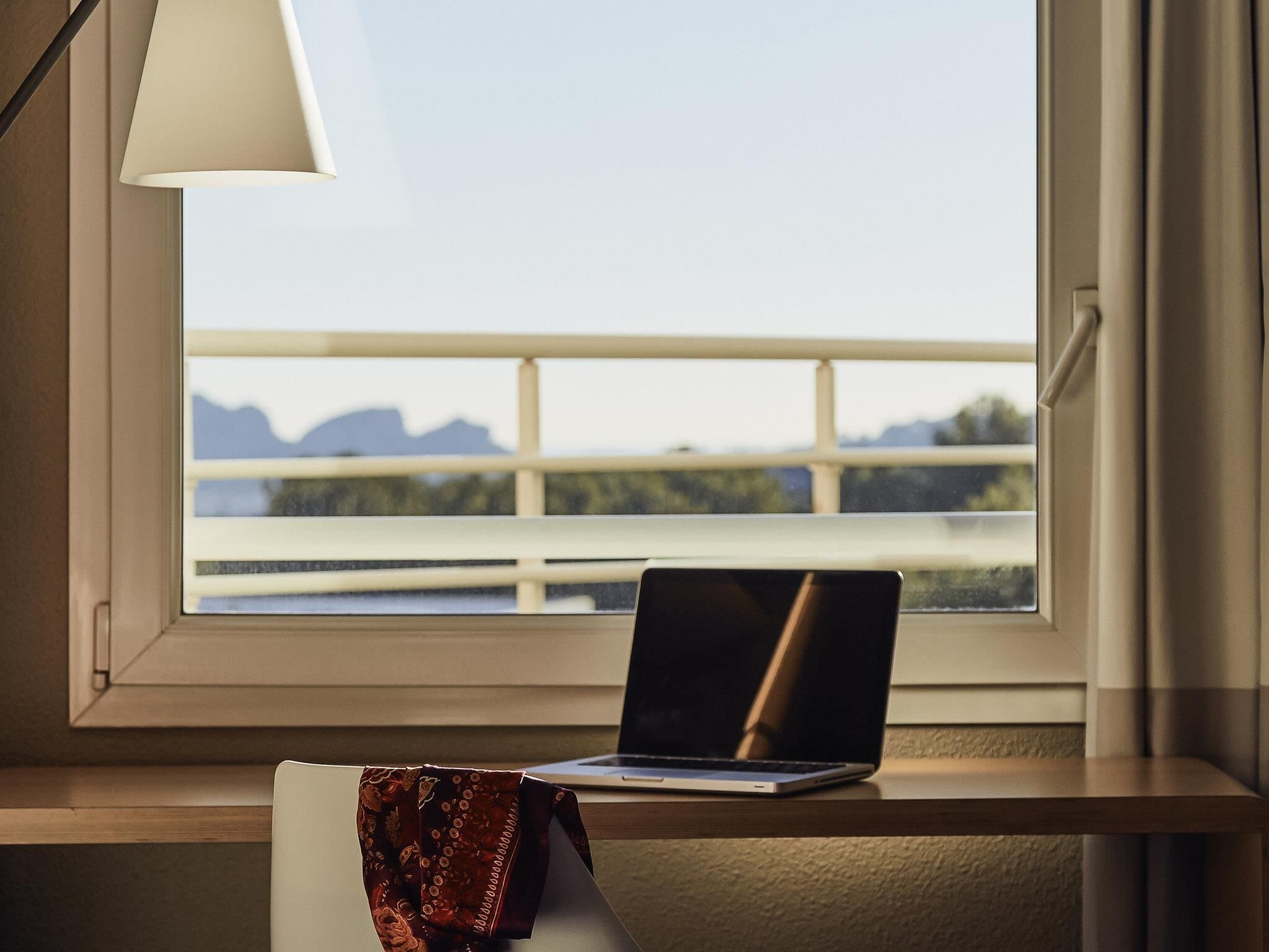 premium bedding, pillow-top beds, desk, blackout curtains