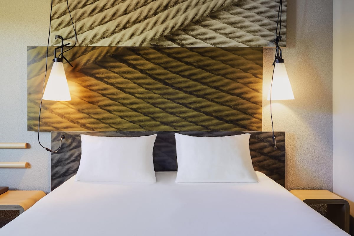 Premium bedding, pillow-top beds, desk, blackout curtains