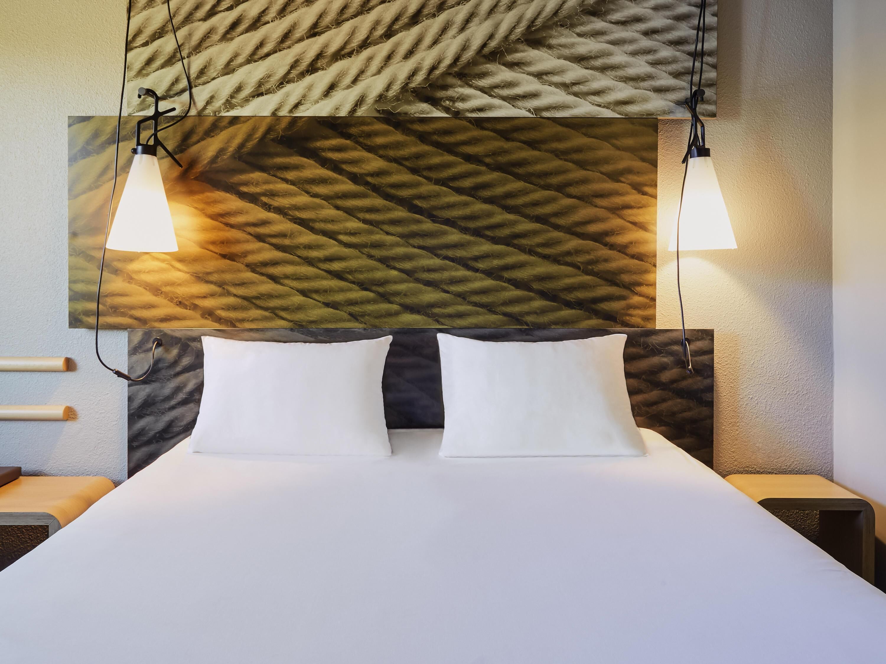 Premium bedding, pillow-top beds, desk, blackout curtains