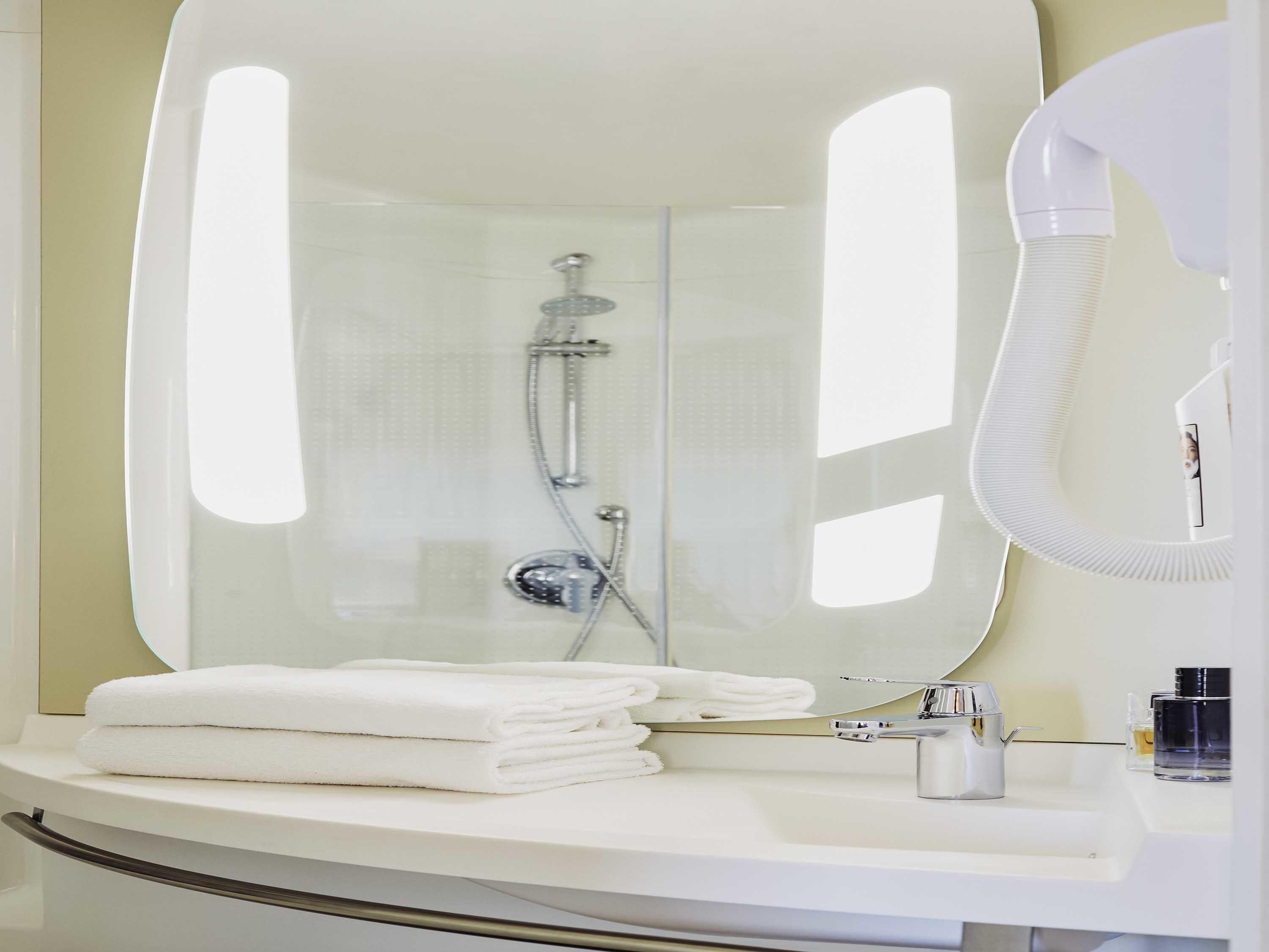 premium bedding, pillow-top beds, desk, blackout curtains