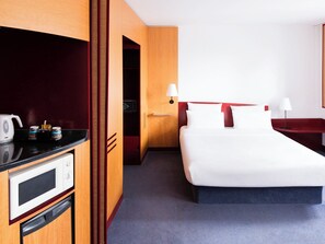 Hypoallergeen beddengoed, een kluis op de kamer, een bureau