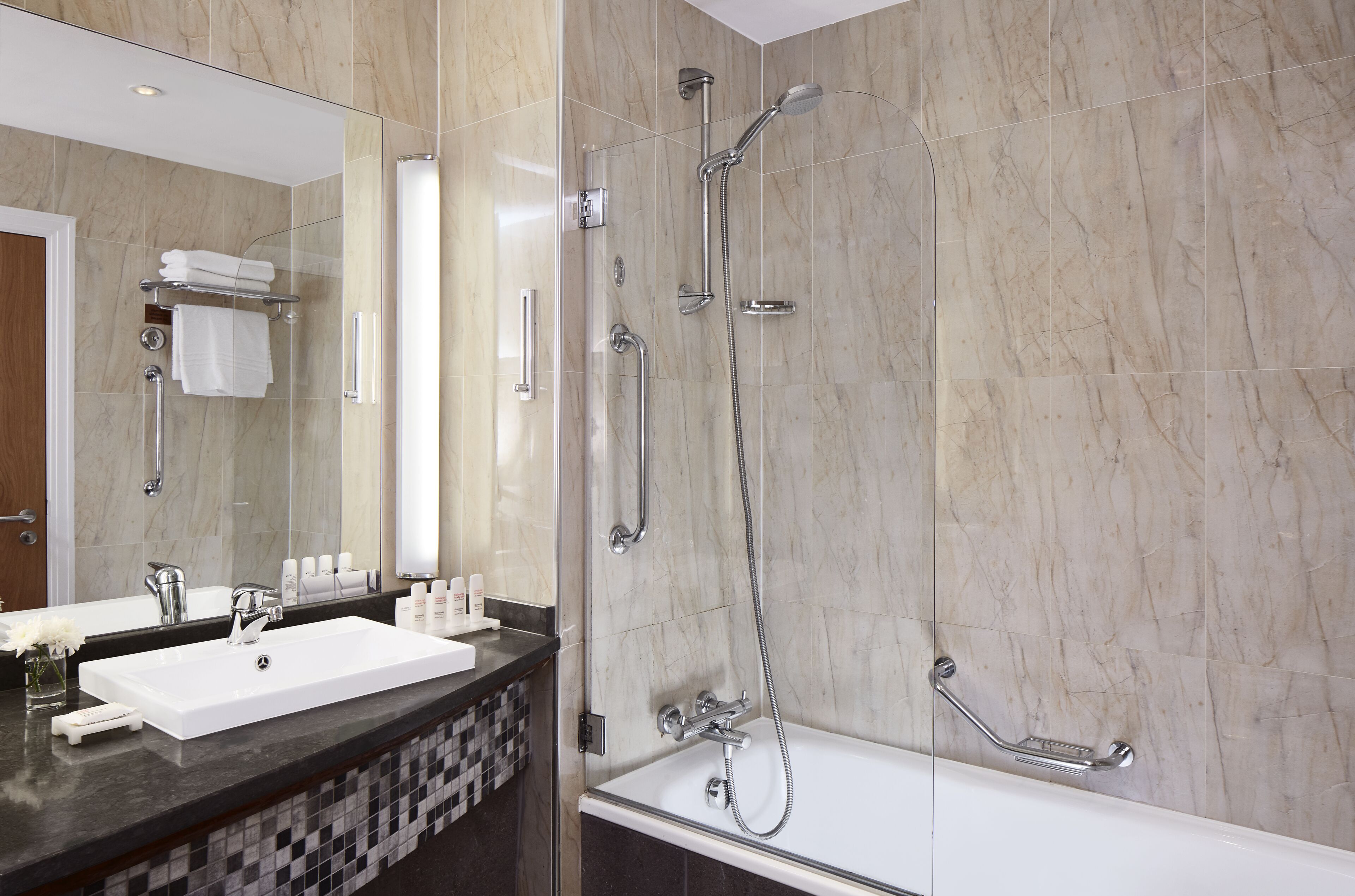 combined shower/bathtub, free toiletries, hair dryer, towels