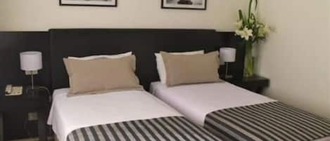 Hypo-allergenic bedding, minibar, in-room safe, desk