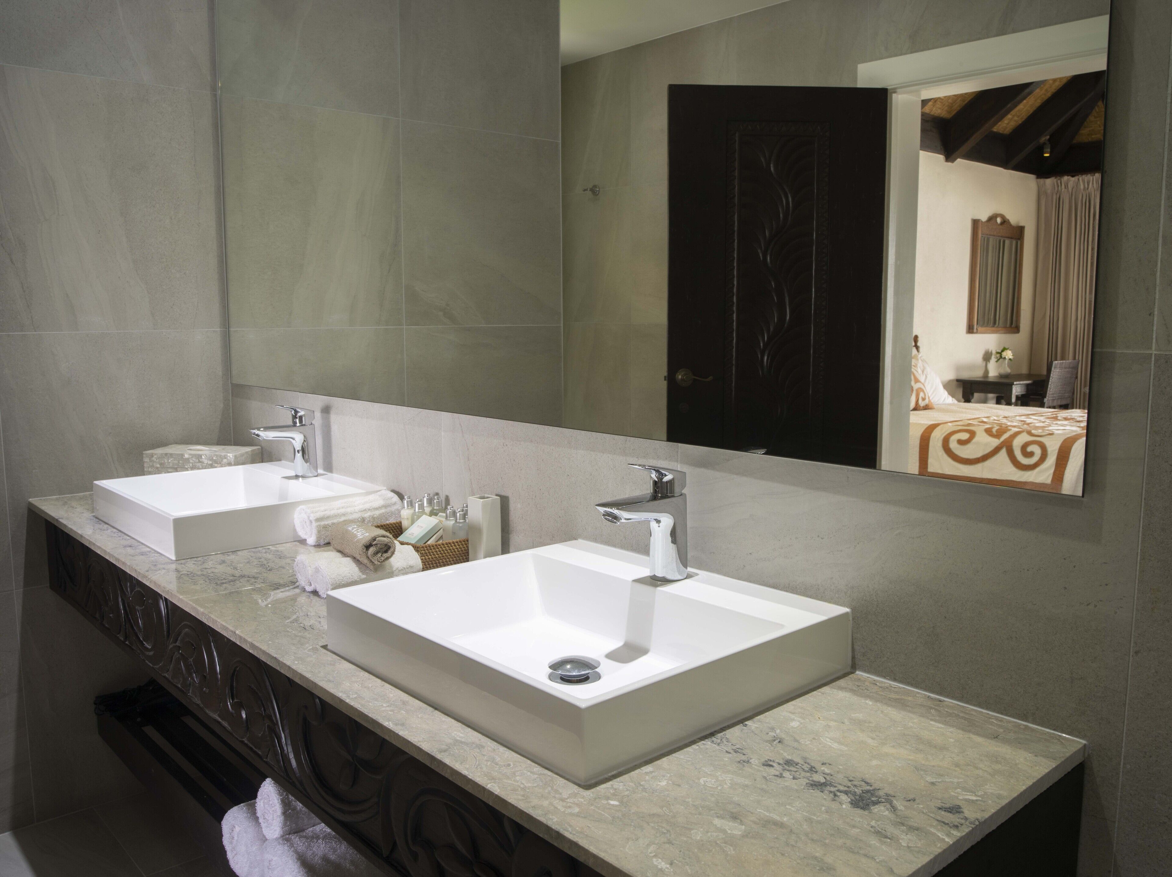 premium beachfront suite | bathroom | shower, free toiletries, hair dryer, towels