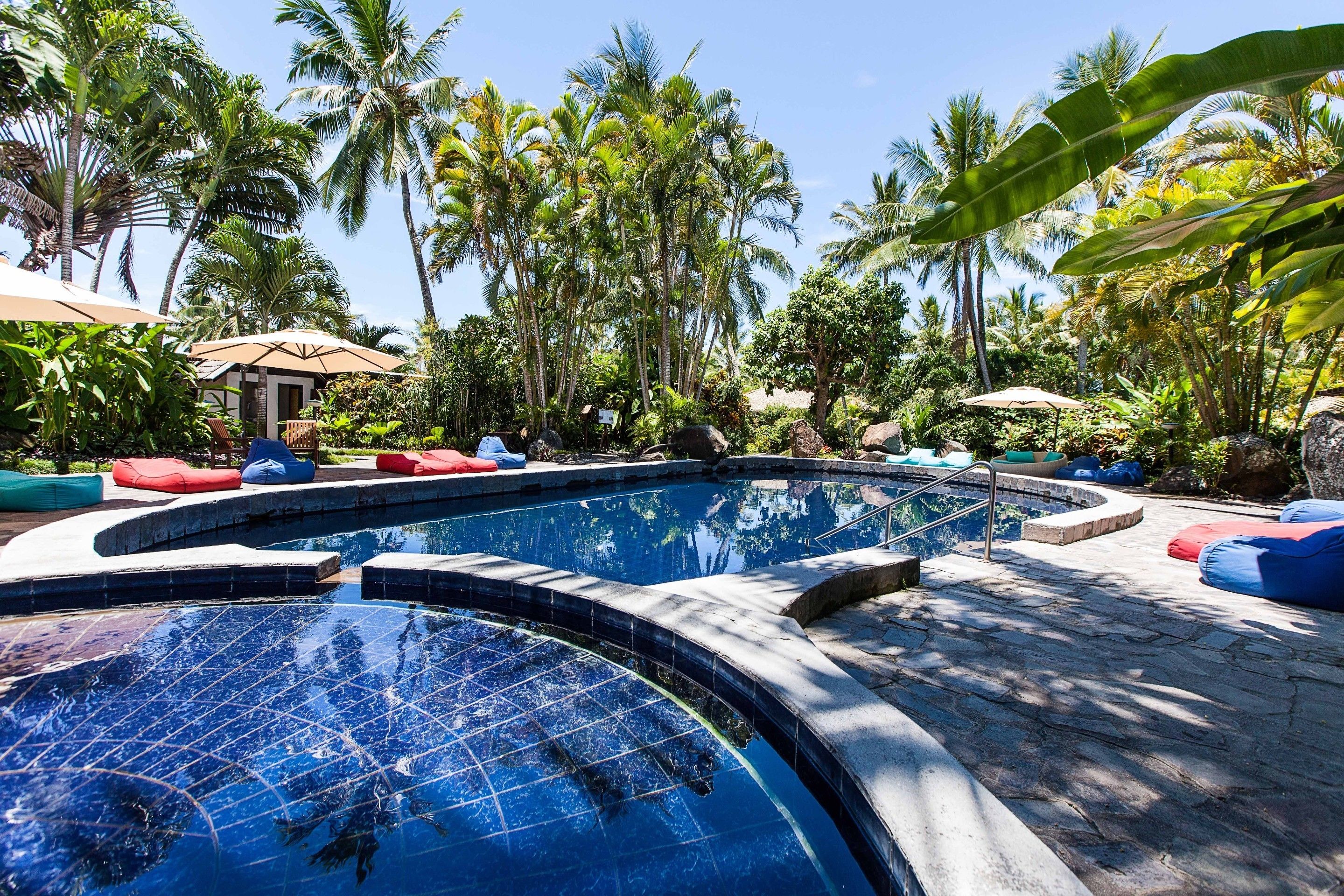 outdoor pool, pool umbrellas, pool loungers