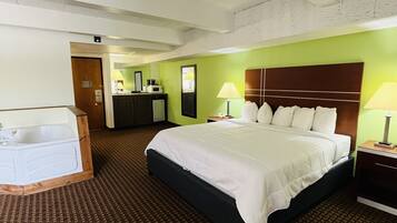 Deluxe Suite | 1 bedroom, desk, laptop workspace, blackout drapes