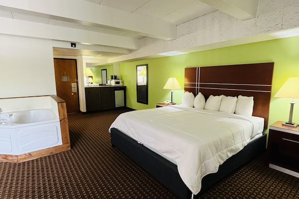 Suite Deluxe | Escritorio, espacio para trabajar con un portátil, cortinas opacas