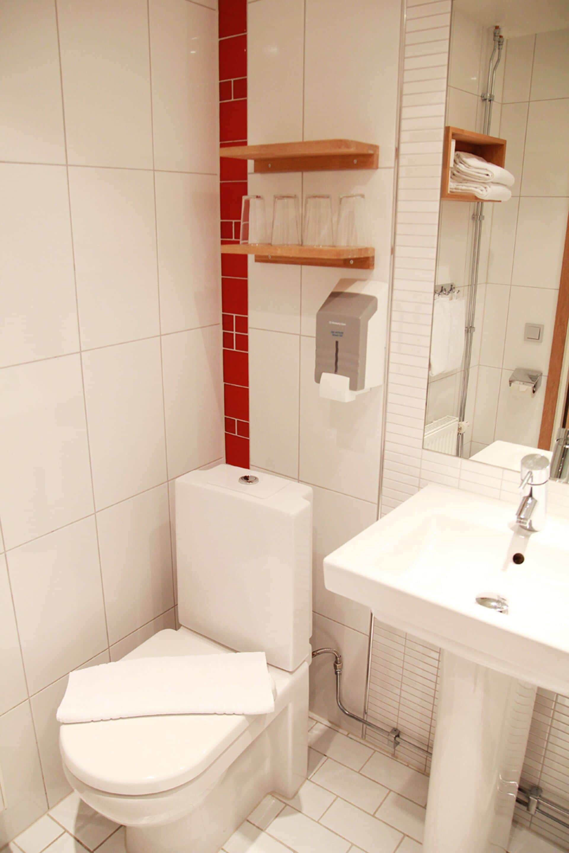 eco-friendly toiletries, hair dryer, towels