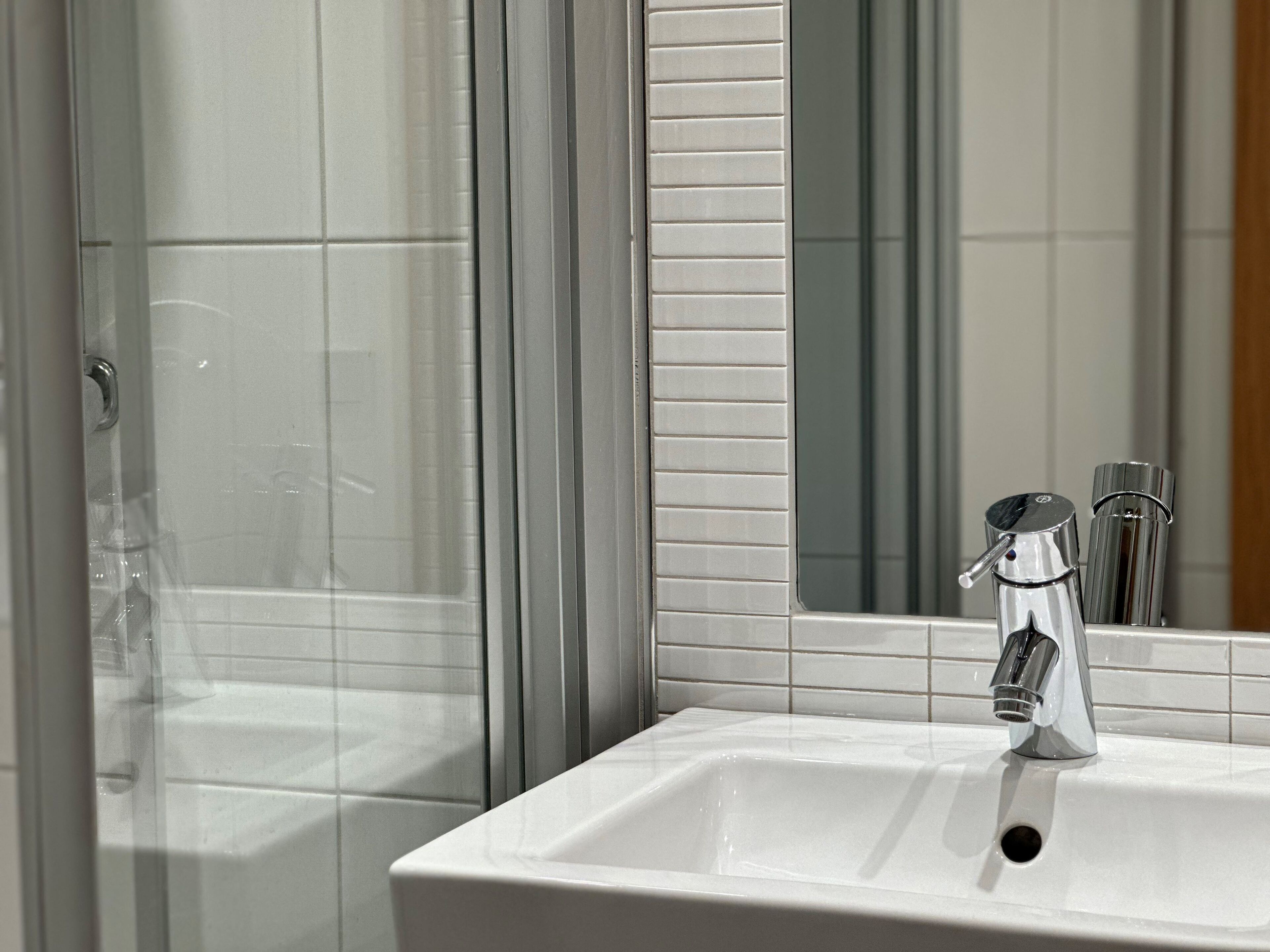 eco-friendly toiletries, hair dryer, towels