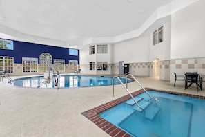 Indoor pool, open 9:00 AM to 10:00 PM, pool loungers