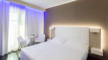 Junior-suite | Premium-sengetøj, minibar, pengeskab på værelset, skrivebord