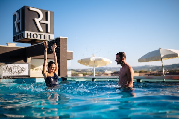 Outdoor pool, pool umbrellas, pool loungers