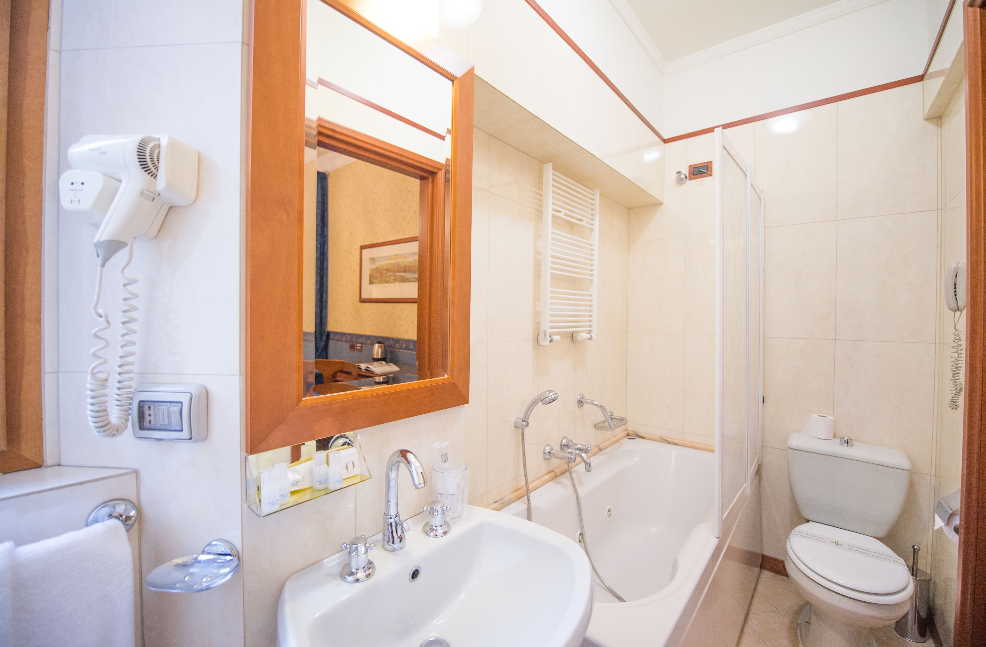 double room single use | bathroom | shower, rainfall showerhead, free toiletries, hair dryer