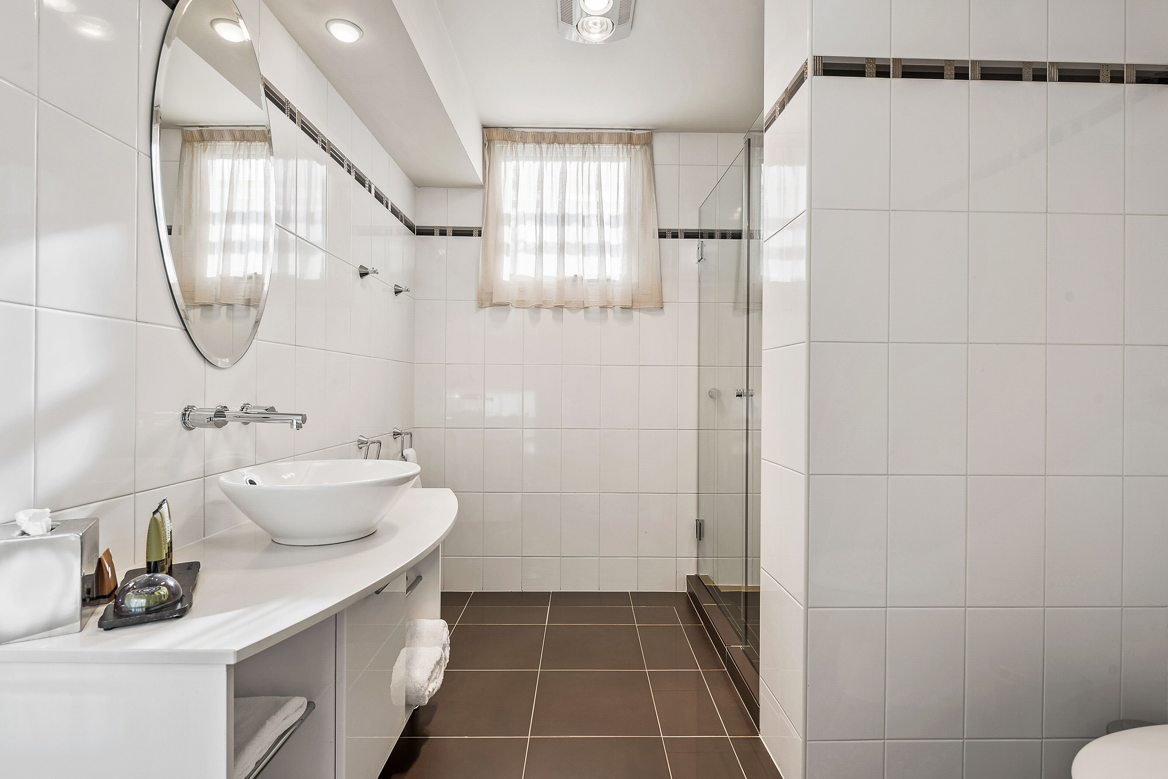 luxury suite, marina view | bathroom | shower, hair dryer, bathrobes, towels
