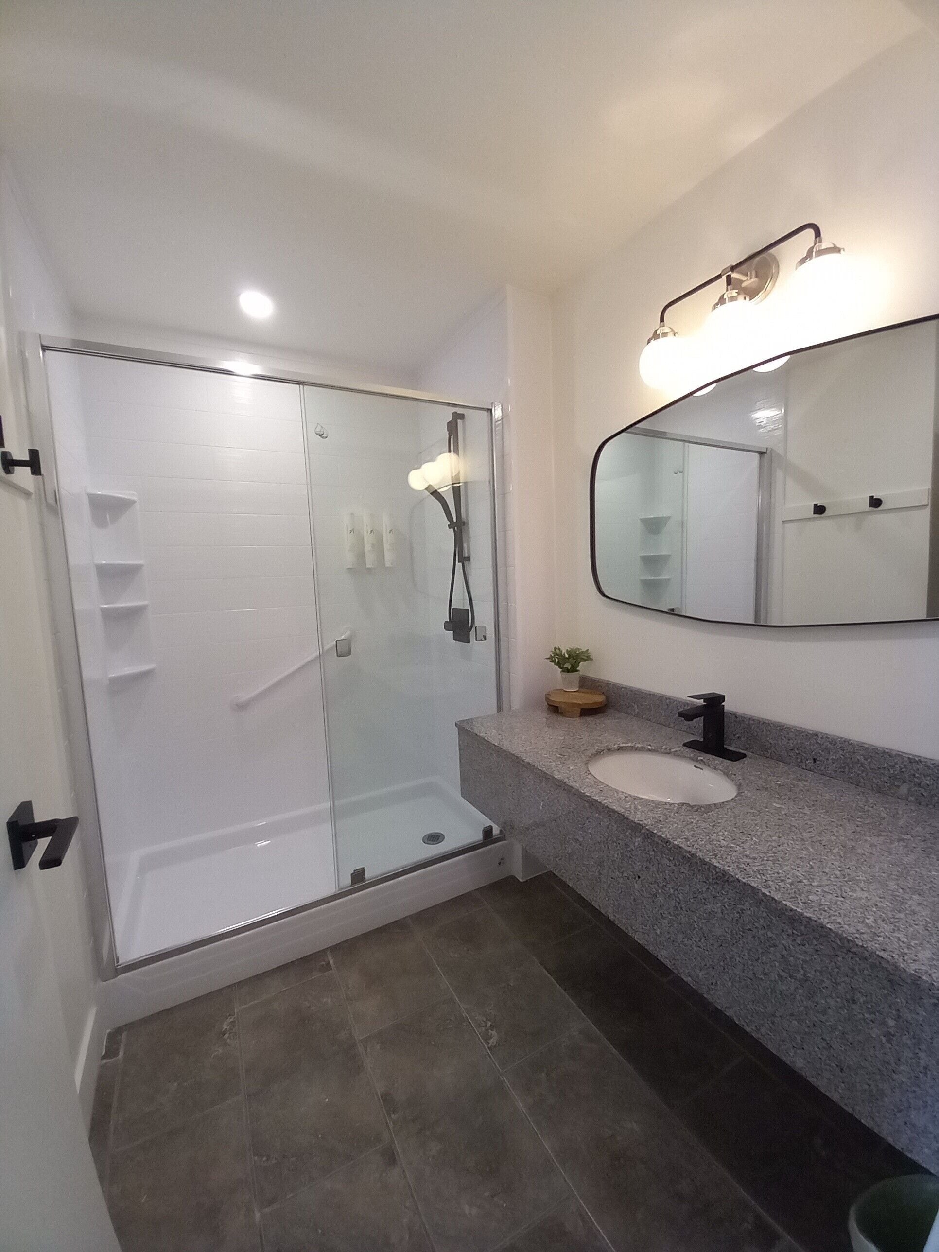 romantic suite, 1 king bed | bathroom | free toiletries, hair dryer, towels