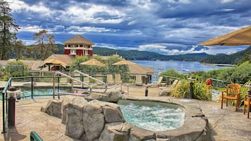 Relax by the pool surrounded by natural rock formations and enjoy a hot tub and smaller pool.