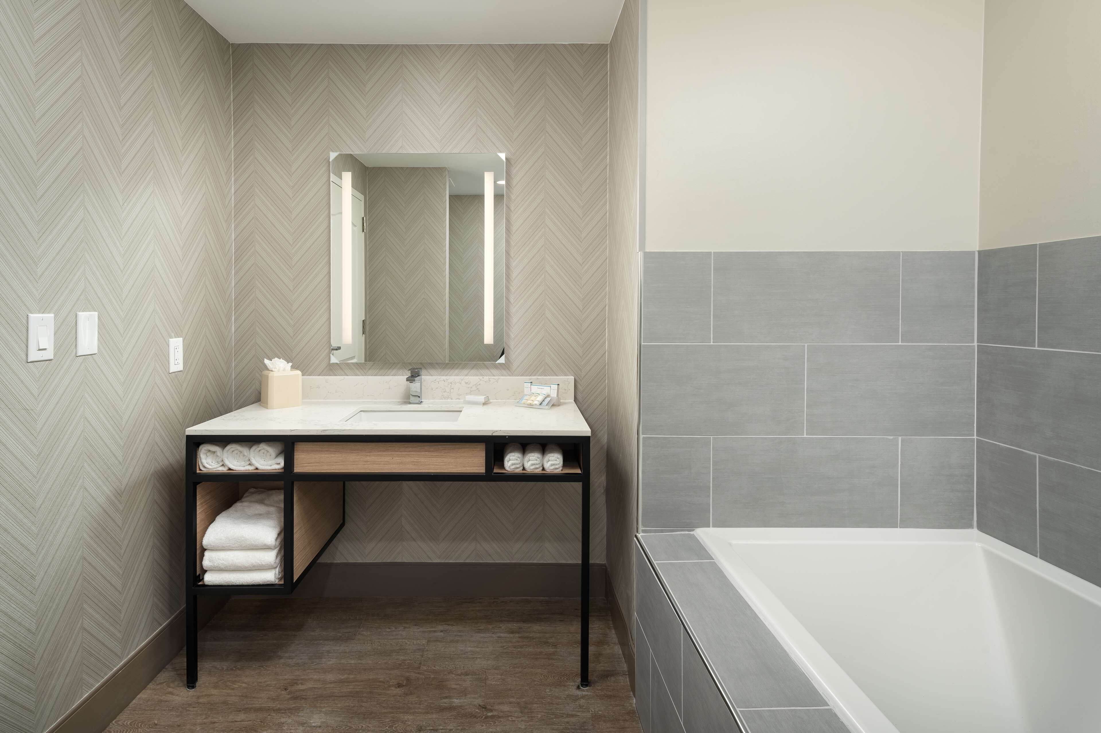 suite | bathroom | combined shower/bathtub, designer toiletries, hair dryer, towels