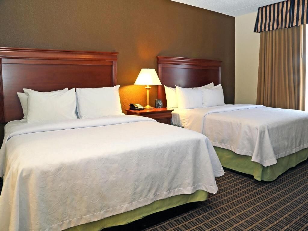 Hypo-allergenic bedding, down comforters, pillowtop beds, in-room safe