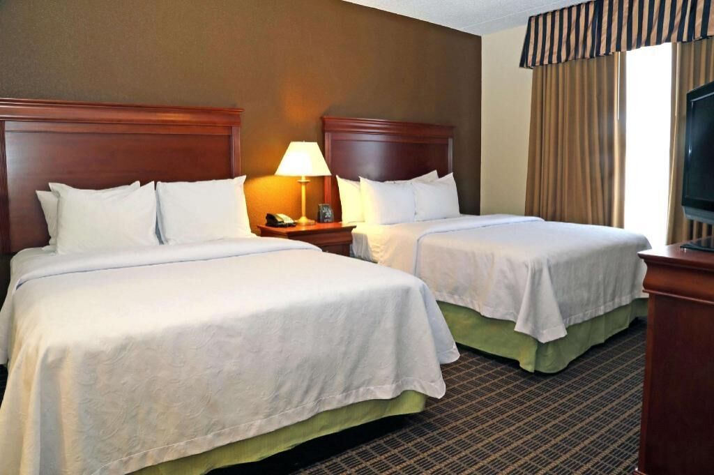 Hypo-allergenic bedding, down comforters, pillowtop beds, in-room safe