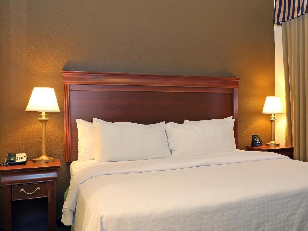 Hypo-allergenic bedding, down comforters, pillowtop beds, in-room safe