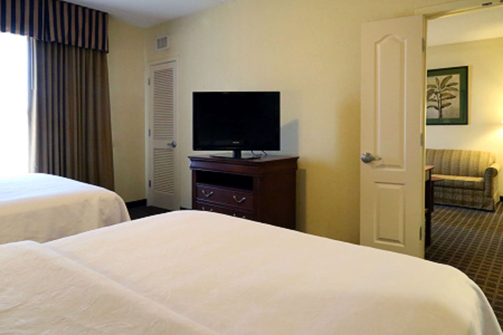 Hypo-allergenic bedding, down comforters, pillowtop beds, in-room safe
