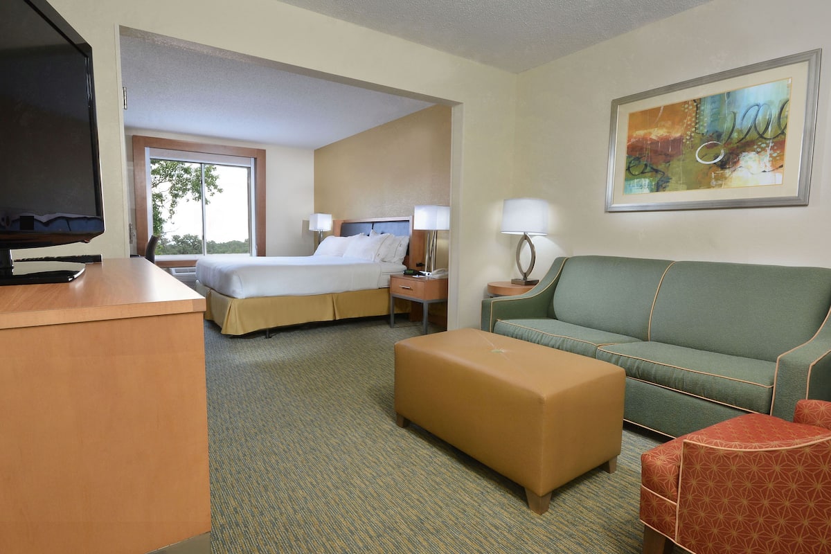 Premium bedding, desk, laptop workspace, iron/ironing board