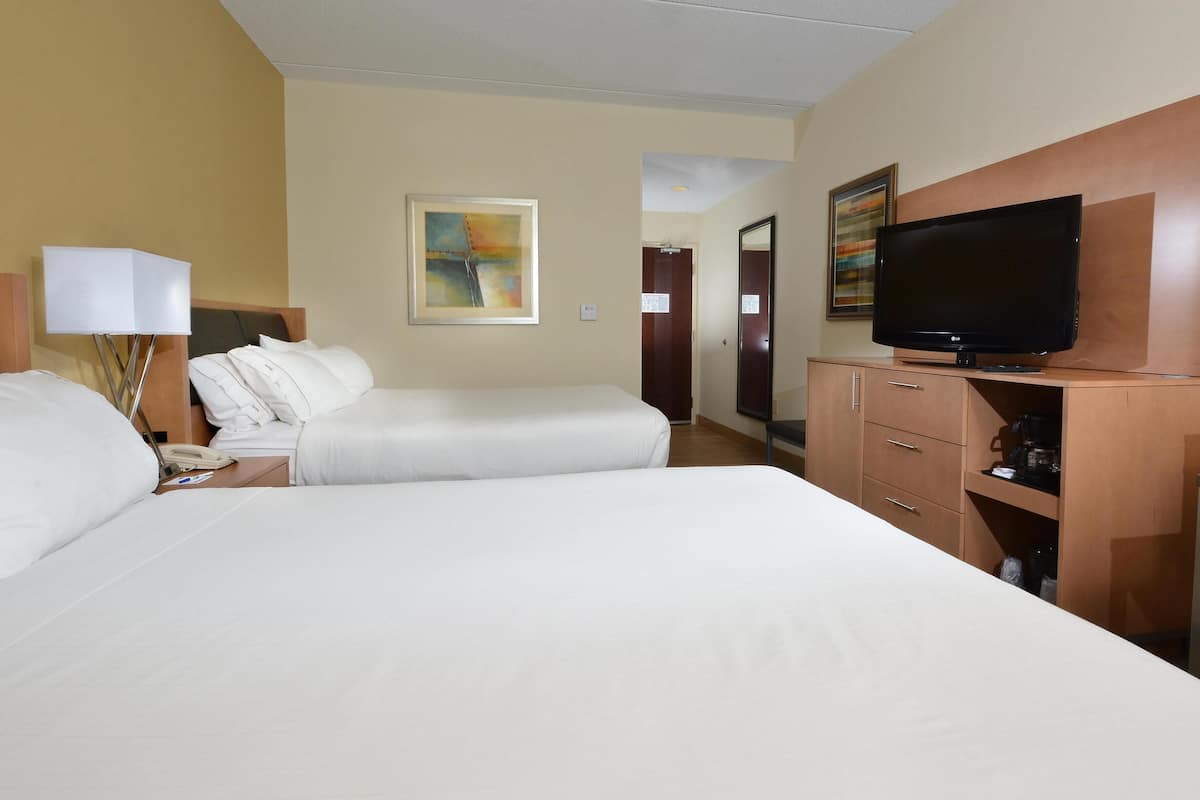 Premium bedding, desk, laptop workspace, blackout curtains