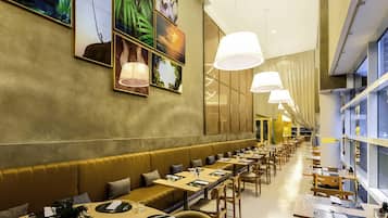 Breakfast, lunch, dinner served; international cuisine