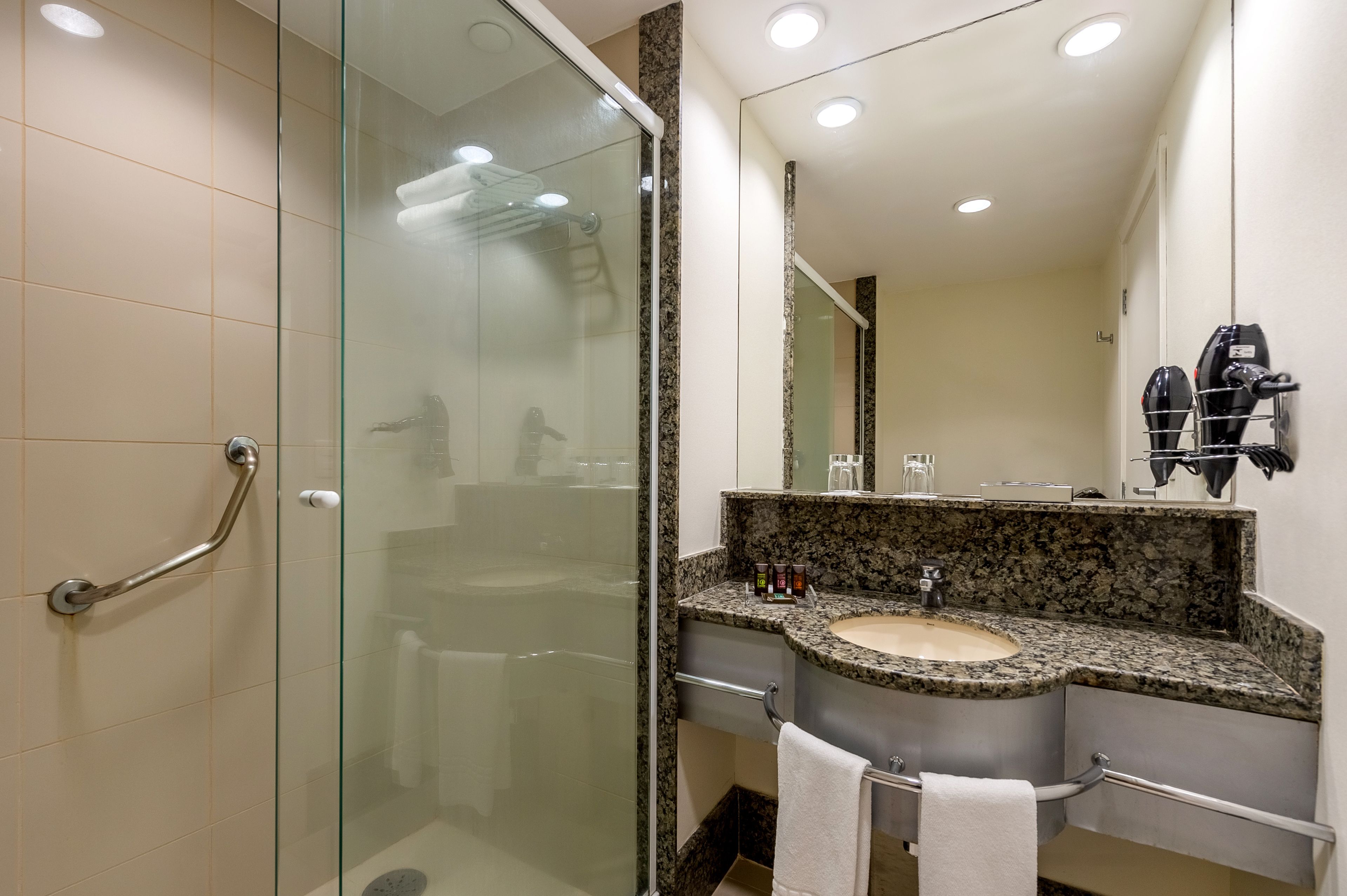 shower, eco-friendly toiletries, hair dryer, towels