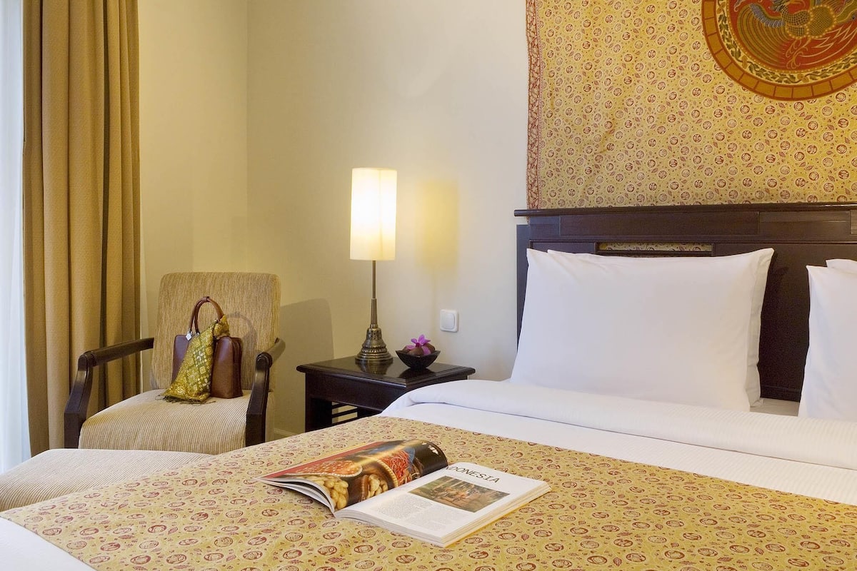Ropa de cama de alta calidad y minibar