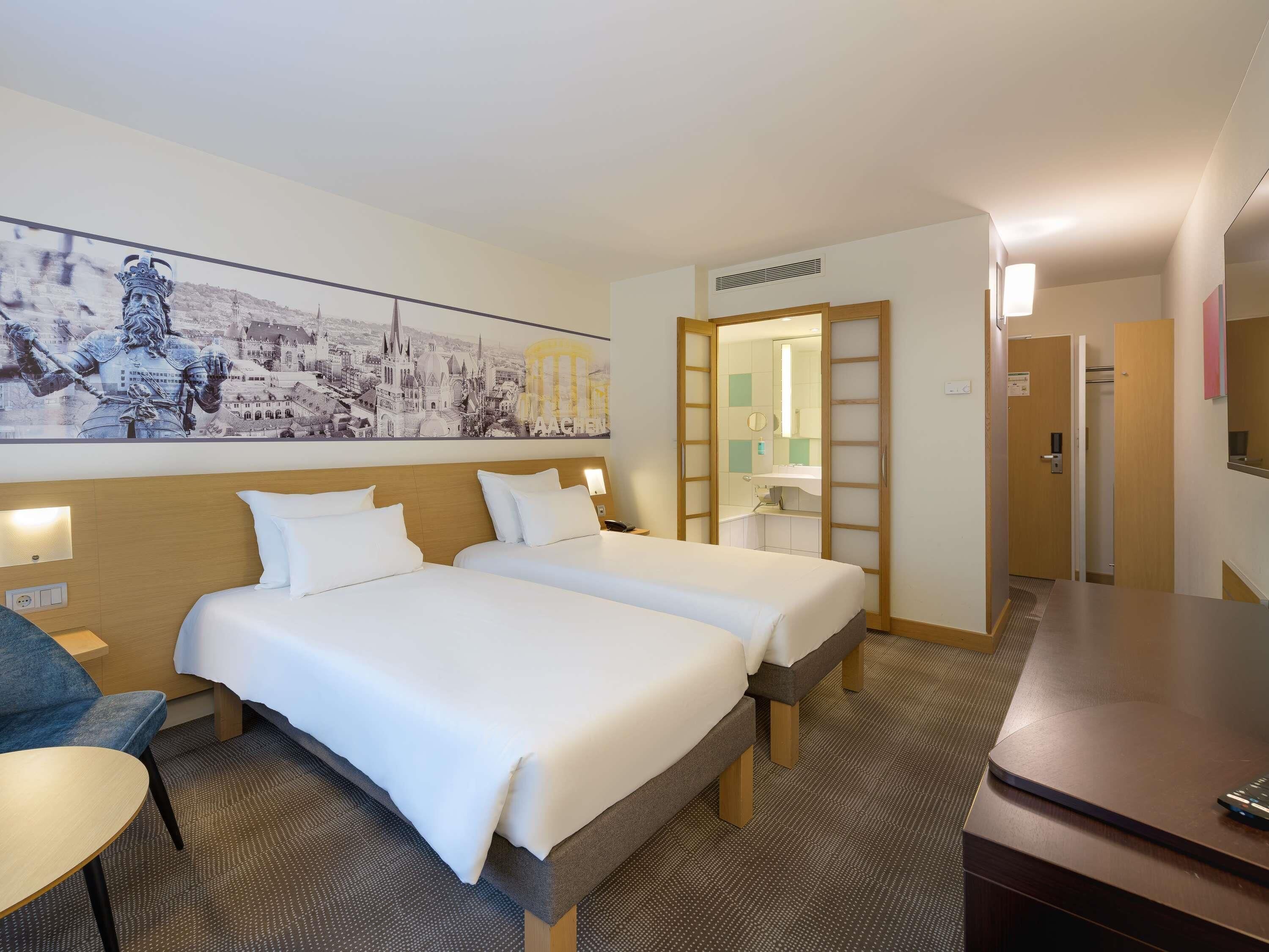 Standaard Twin kamer, 2 eenpersoonsbedden | Hypoallergeen beddengoed, een kluis op de kamer, een bureau