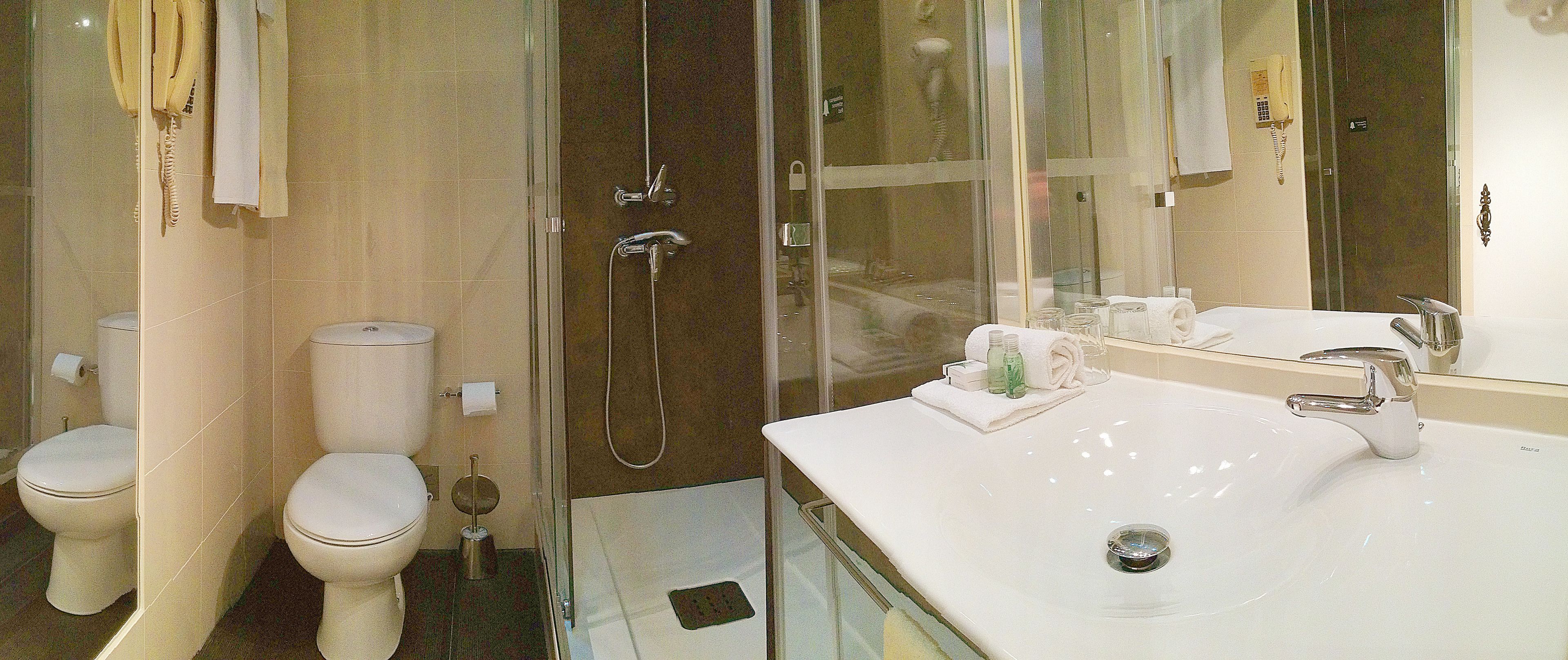 deep-soaking bathtub, free toiletries, hair dryer, towels