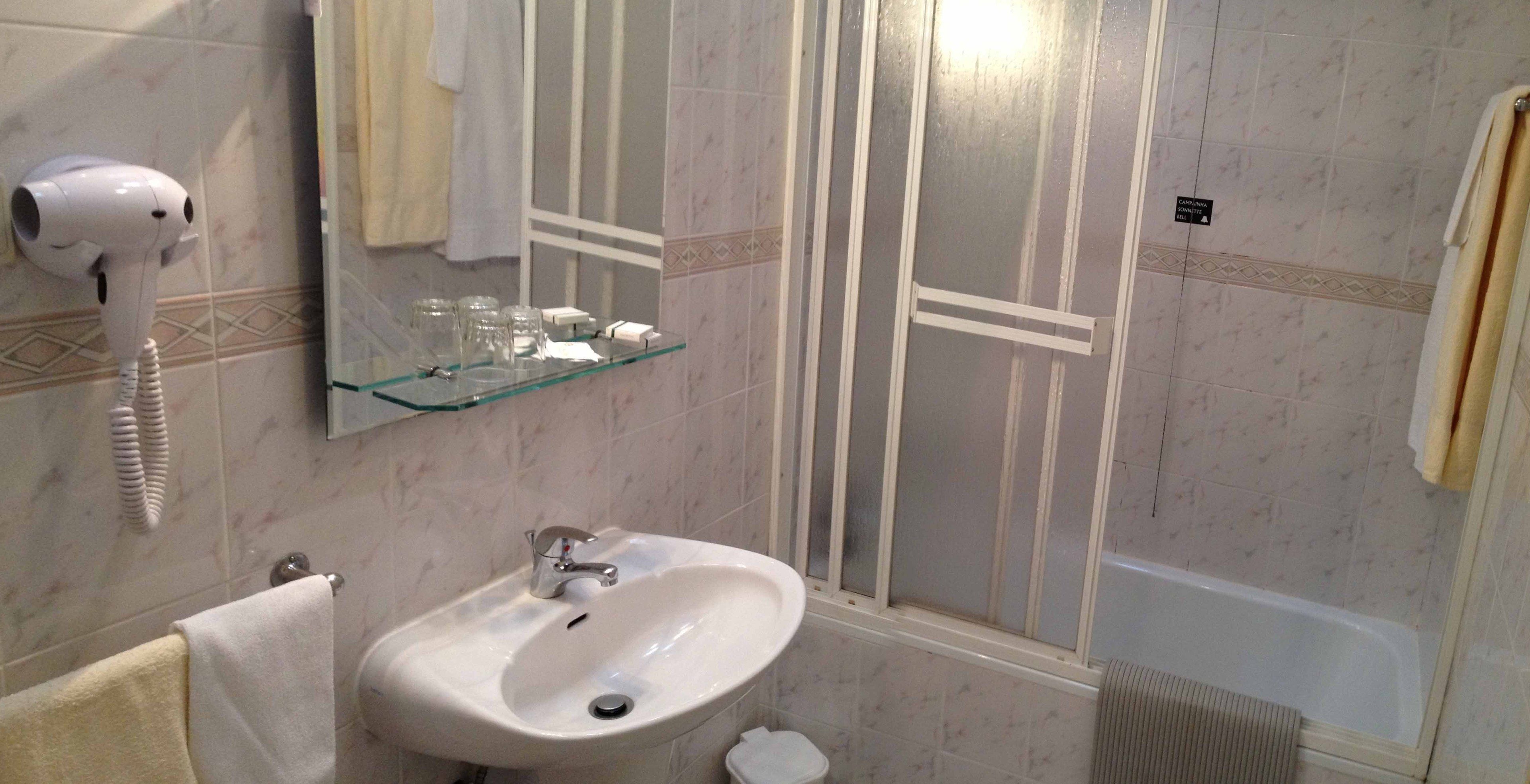 deep-soaking bathtub, free toiletries, hair dryer, towels