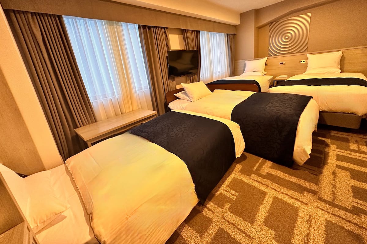 ห้องซูพีเรียสำหรับสี่ท่าน, ปลอดบุหรี่ | เครื่องนอนระดับพรีเมียม, ผ้านวมขนเป็ด, ตู้นิรภัยในห้องพัก, ผ้าม่านกันแสง