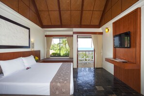 Deluxe Room, Sea View | Minibar, in-room safe, desk, free WiFi