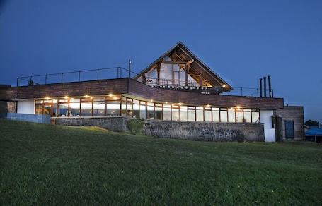 Front of property - evening/night. Hotel Panamericana Ancud