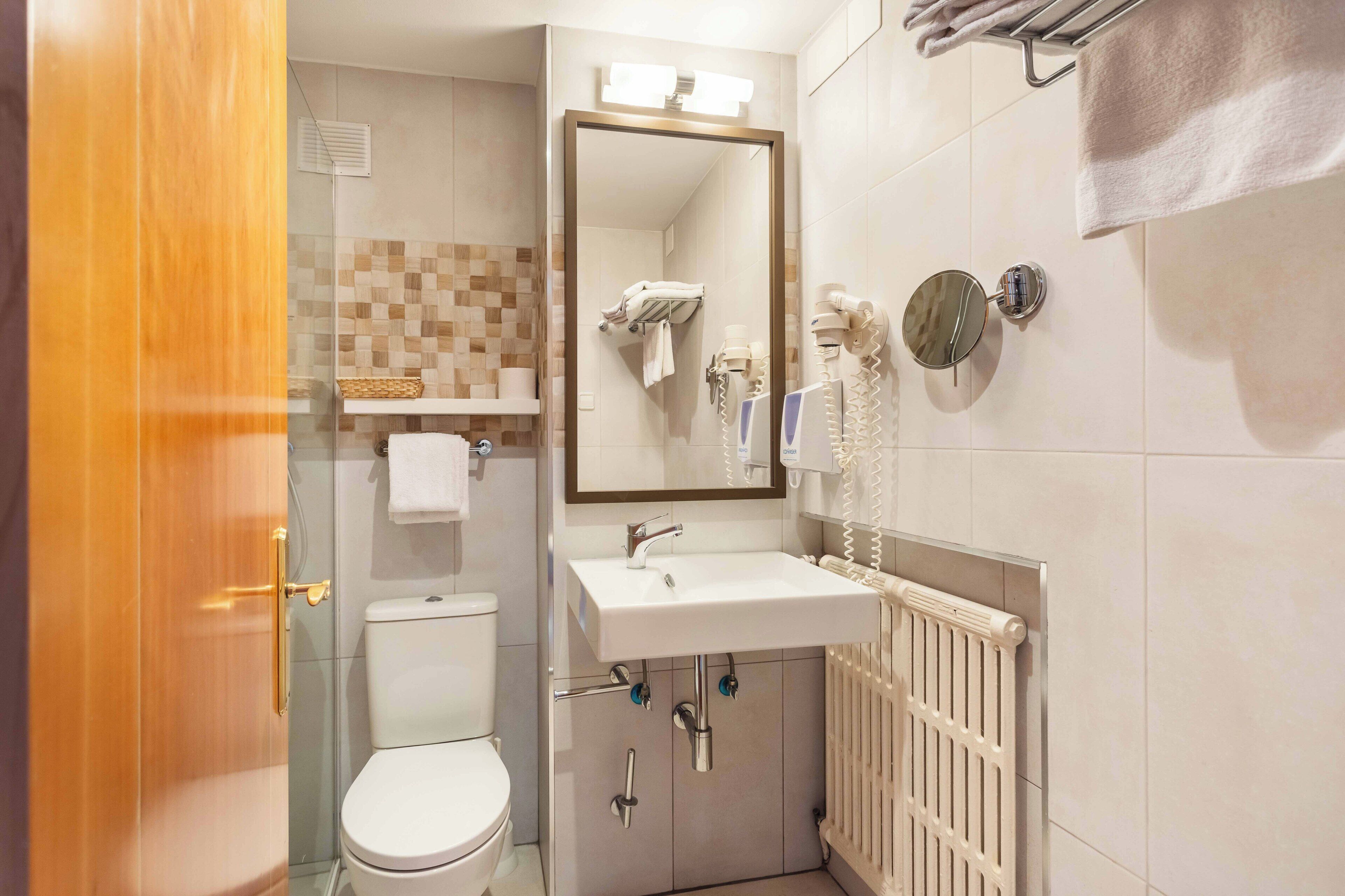 classic double room | bathroom | hair dryer, towels