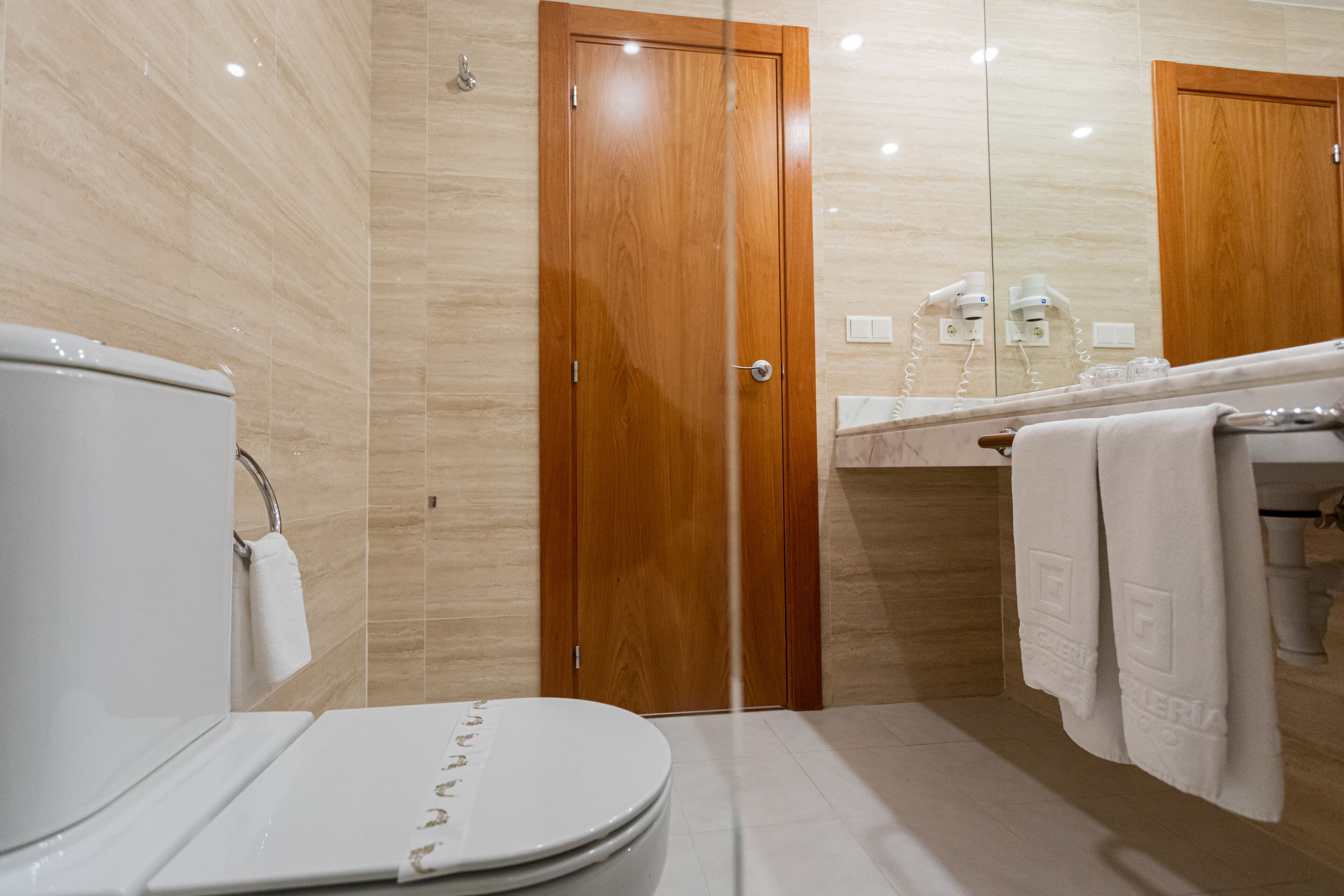 free toiletries, hair dryer, bidet, towels