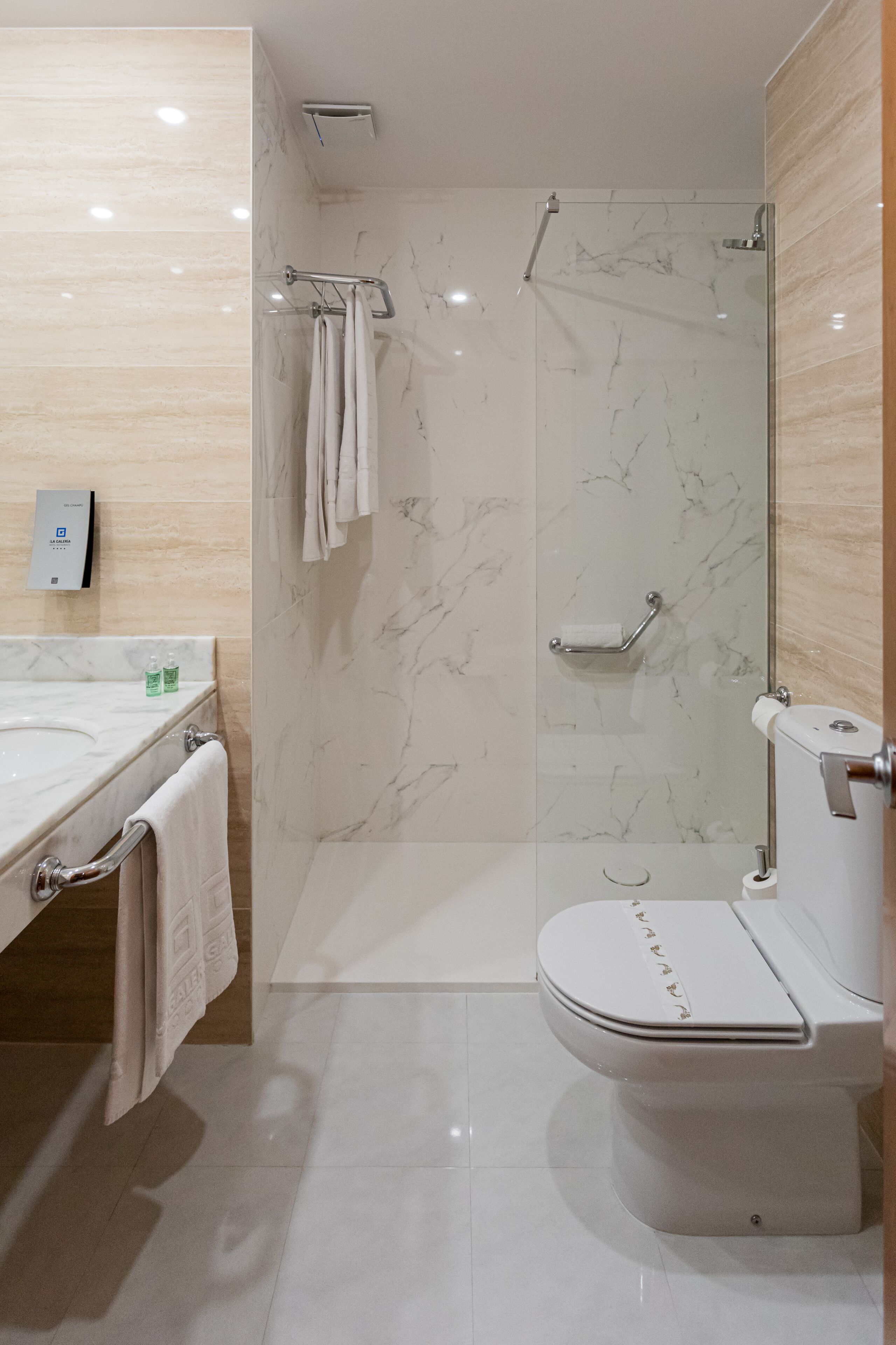 free toiletries, hair dryer, bidet, towels