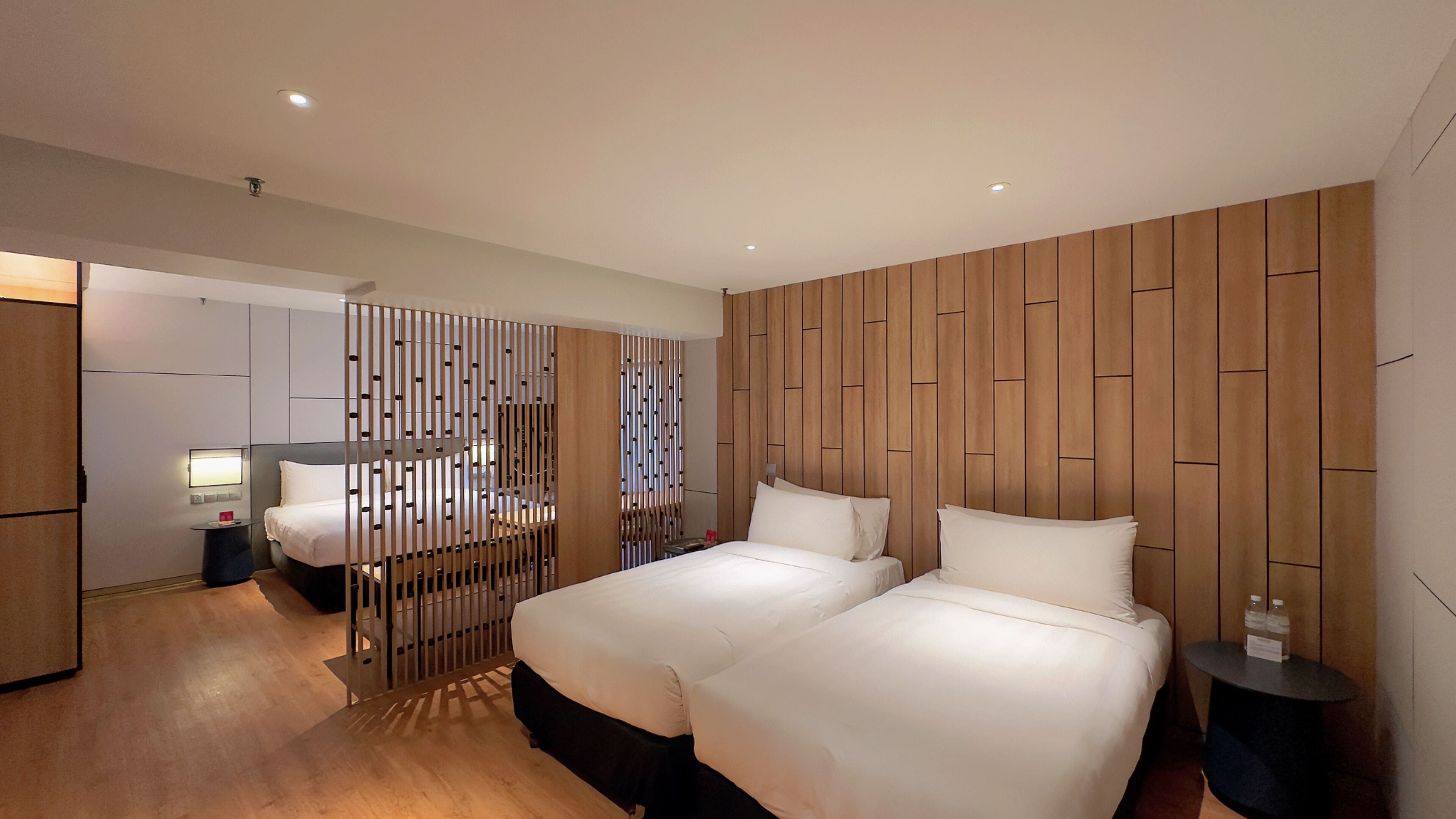 premier family room | minibar, in-room safe, desk, blackout curtains