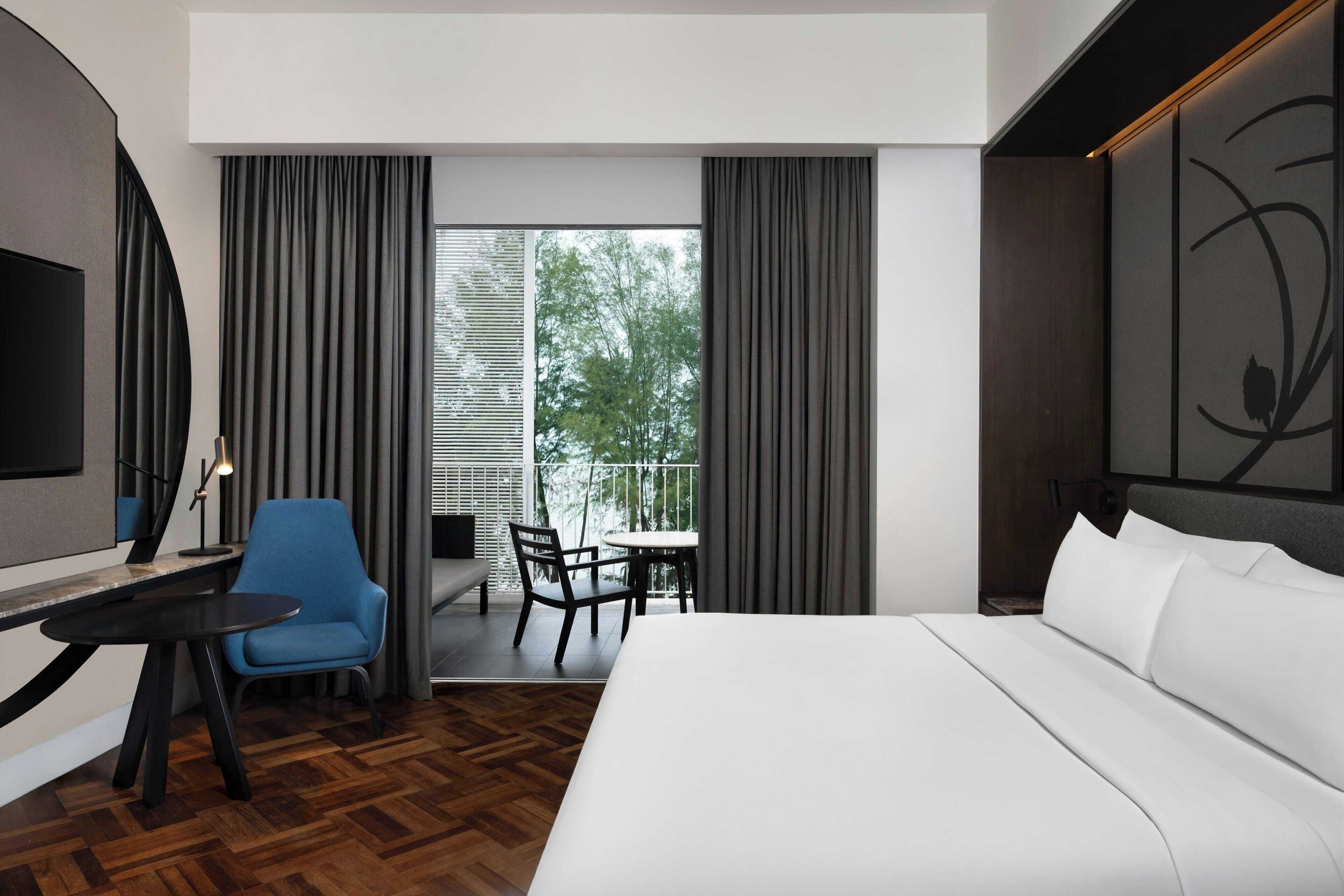 Deluxe Room, 1 King Bed (Sea Facing, Balcony) | Minibar, in-room safe, desk, blackout drapes