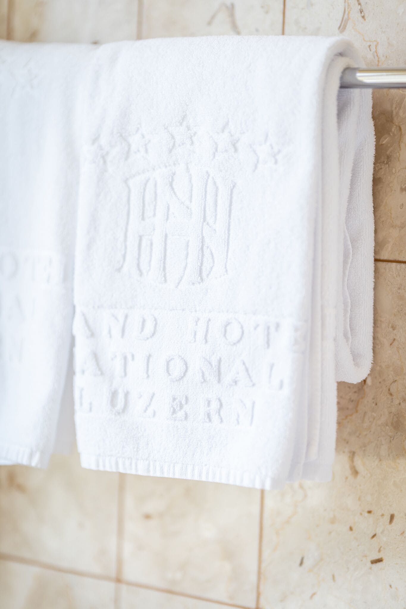 designer toiletries, hair dryer, bathrobes, slippers