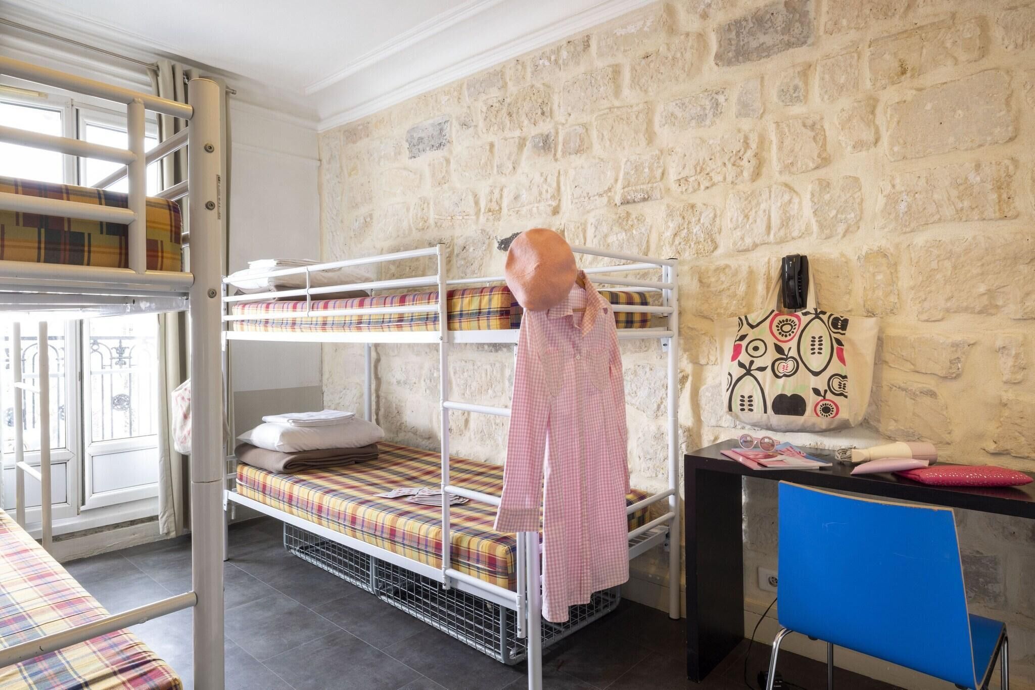 Desk, blackout curtains, iron/ironing board (on request), travel cot