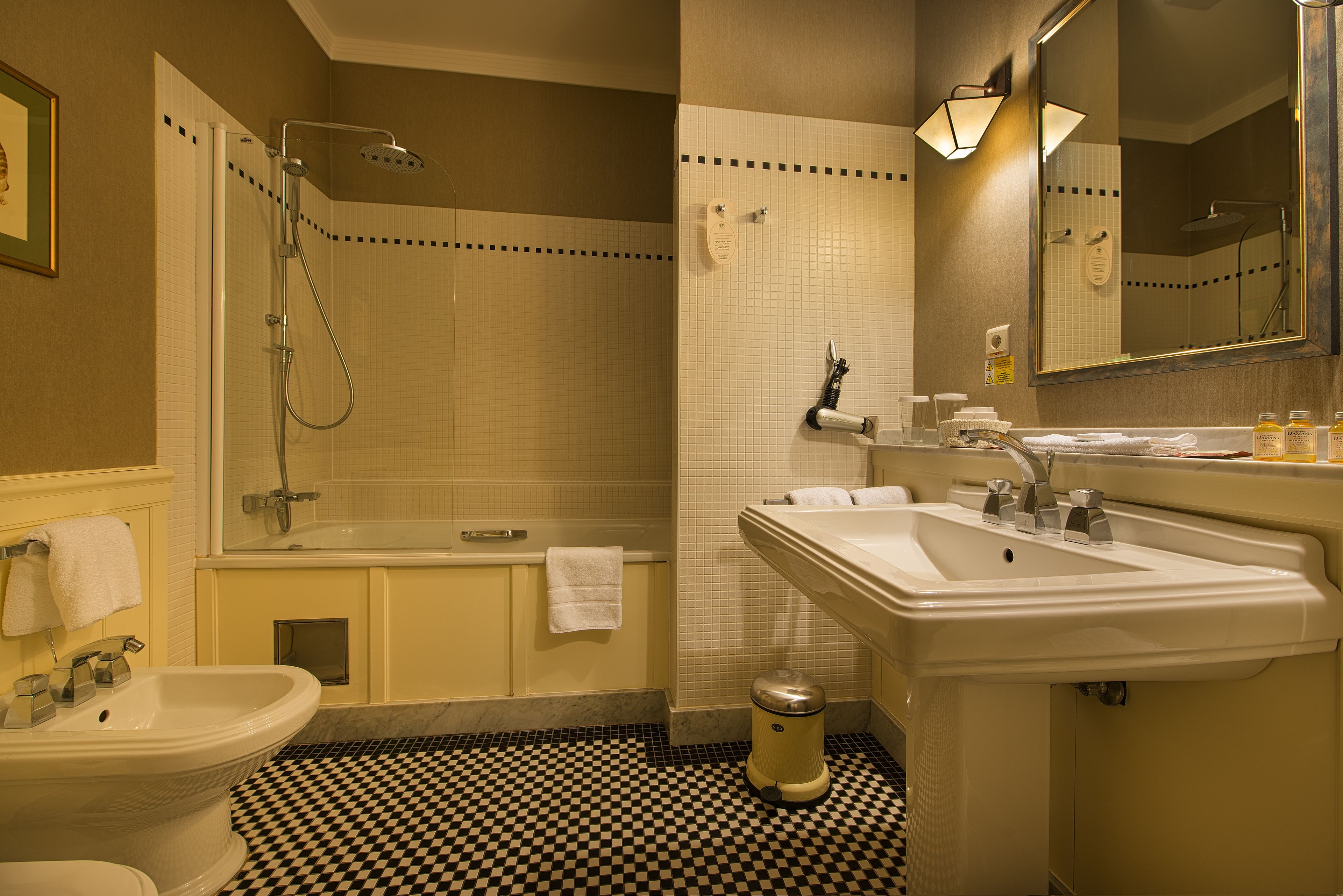 luxury suite | bathroom | free toiletries, hair dryer, bathrobes, slippers