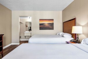 Premium bedding, blackout drapes, free WiFi, bed sheets