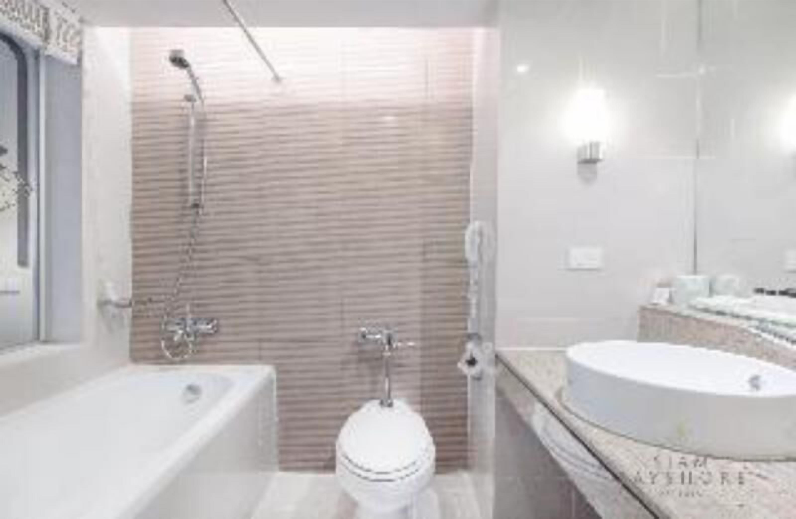 Bathroom | Separate bathtub and shower, rainfall showerhead, free toiletries