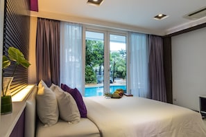 Deluxe Room, 1 King Bed, Pool Access | In-room safe, individually furnished, desk, laptop workspace - The L Resort (Krabi)