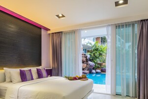 Deluxe Room, 1 King Bed, Pool Access | In-room safe, individually furnished, desk, laptop workspace